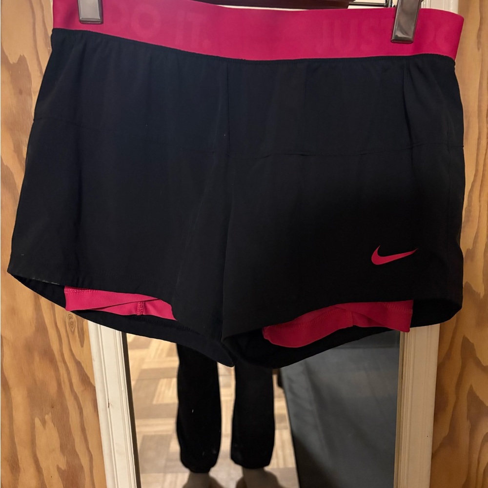 Nike Black and Pink Athletic Shorts with Fitted Design